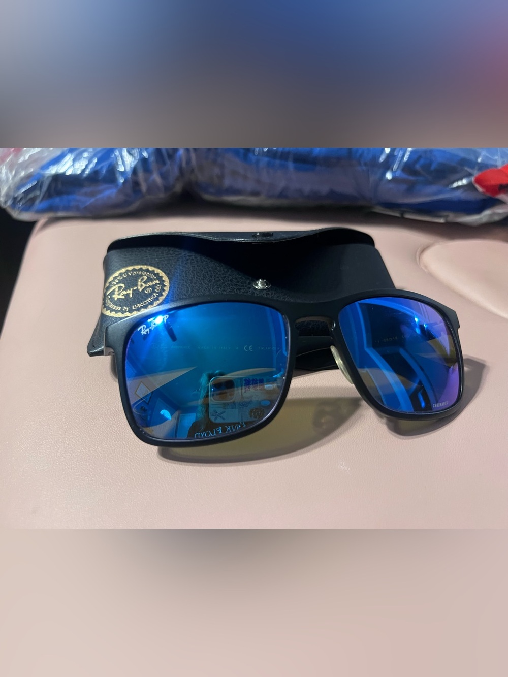 Ray-Ban Black Frame Sunglasses with Blue Mirrored Lenses